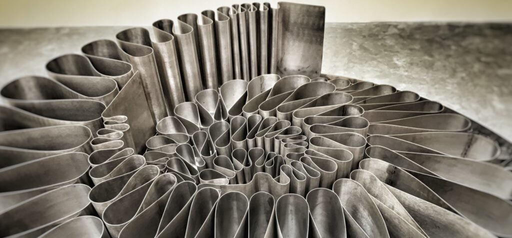 Stainless steel outdoor sculpture shaligram, Fibonacci spiral