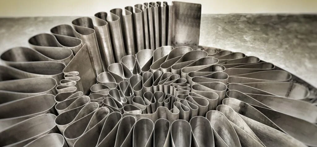 Stainless steel outdoor sculpture shaligram, Fibonacci spiral