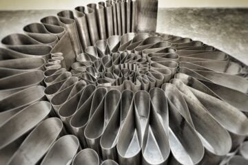 Stainless steel outdoor sculpture shaligram, Fibonacci spiral