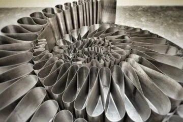 Stainless steel outdoor sculpture shaligram, Fibonacci spiral